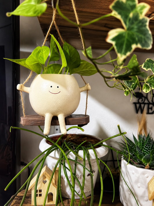 Swinging Smiling Face Pot
